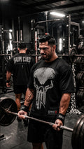 Iron Rebel mesh pump cover worn by a model in an industrial gym