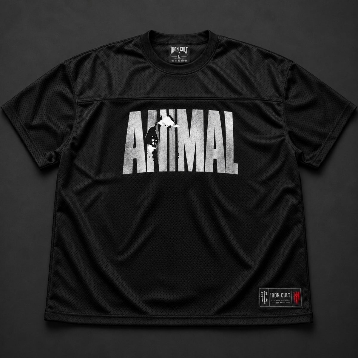 Black mesh pump cover flat lay with reflective ANIMAL chest graphic