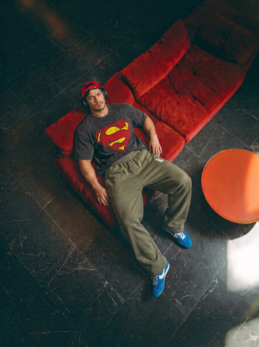 Black acid-wash Man of Steel tee styled in editorial lifestyle shoot