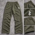 Olive green soft terry trousers flat lay