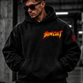 Iron Cult washed black hoodie front view with red and yellow chest logo